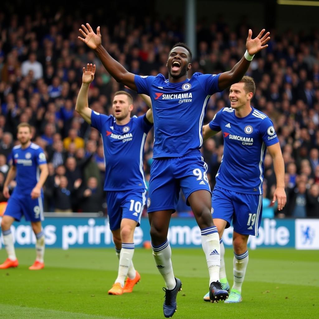 Amadou Sarr in Chelsea's blue jersey, celebrating a goal