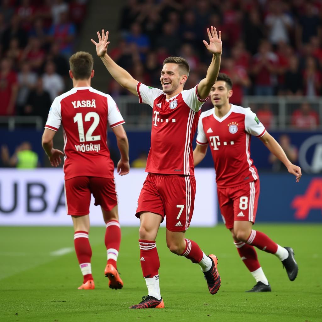 Kacper Urbański celebrates a goal with his teammates