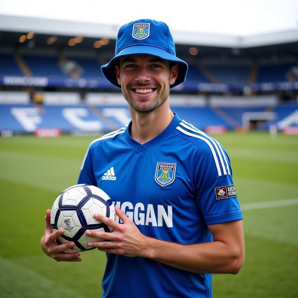 Kieran Charnock đội Wigan hat.