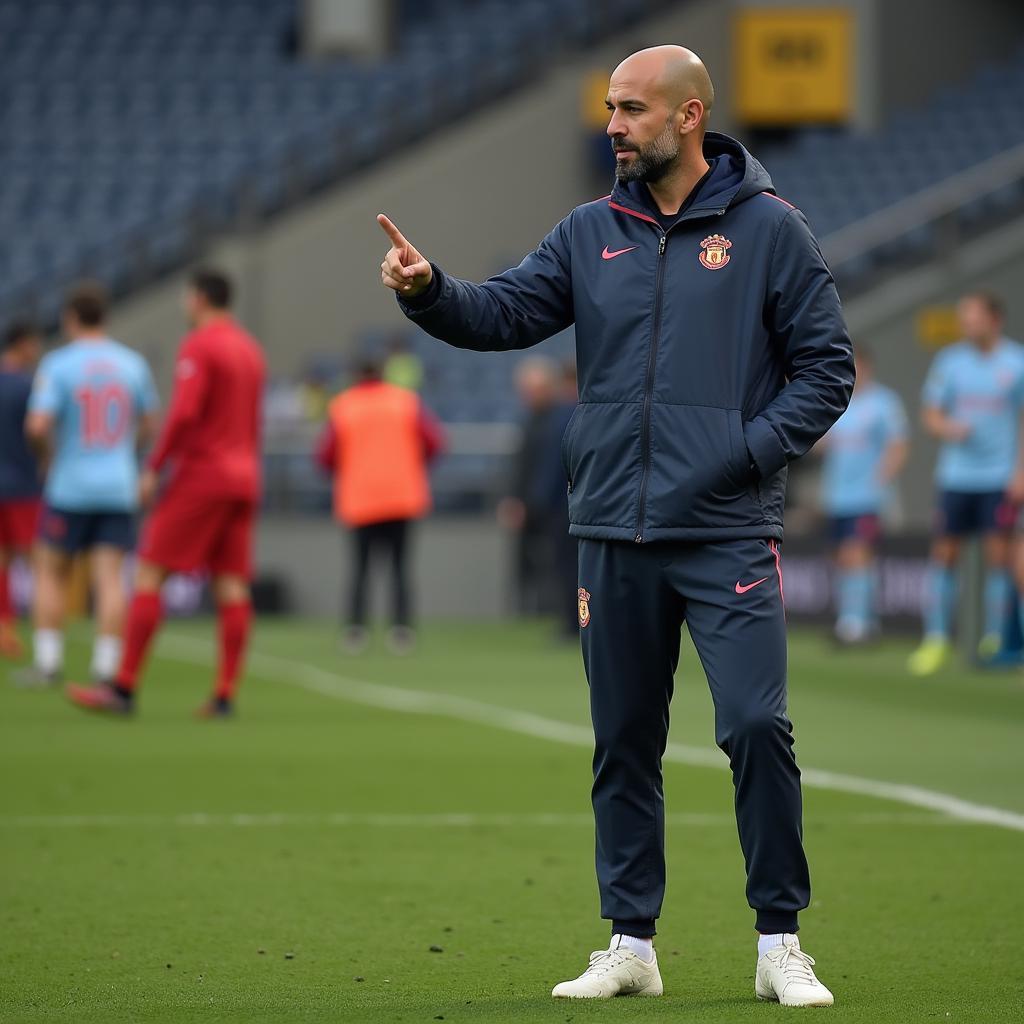 Pep Guardiola trò chuyện chiến thuật cùng cầu thủ