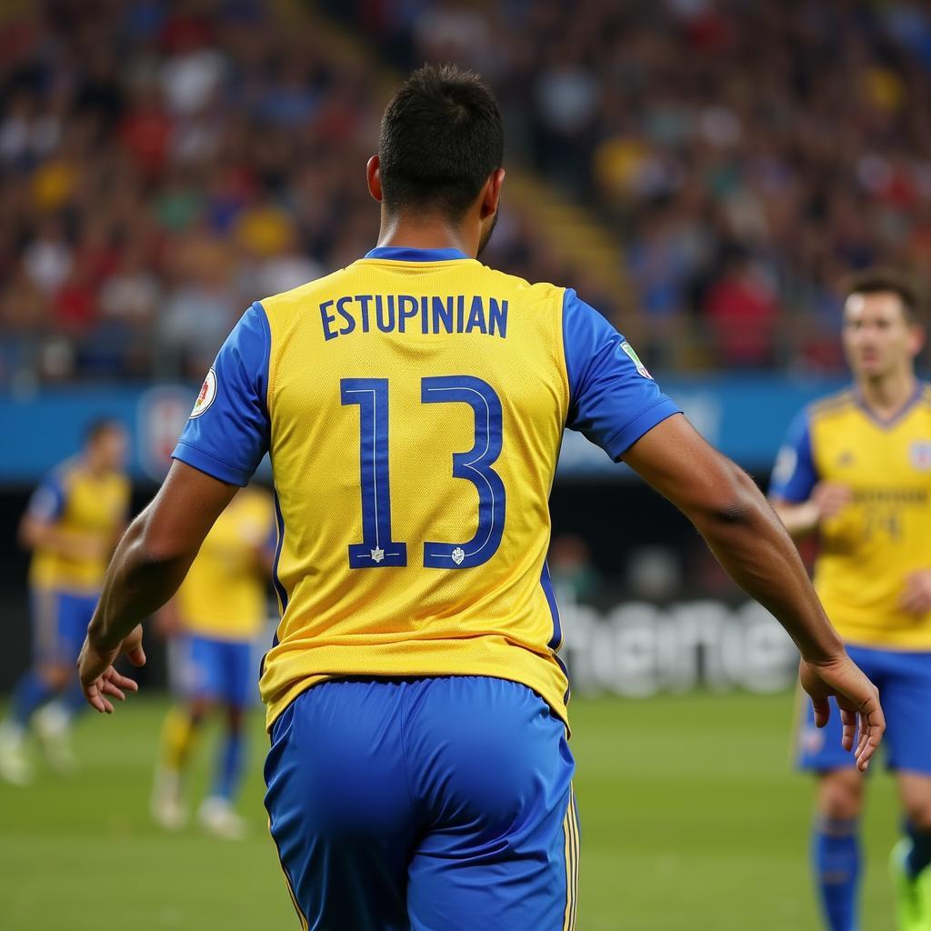 Pervis Estupiñán in his Brighton & Hove Albion kit