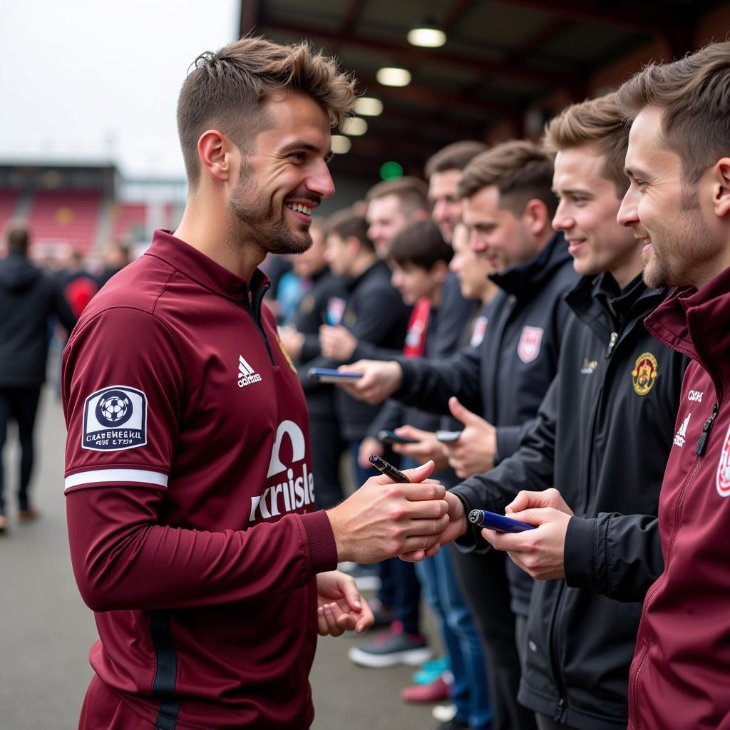 Jed Brown meets Crawley Town fans