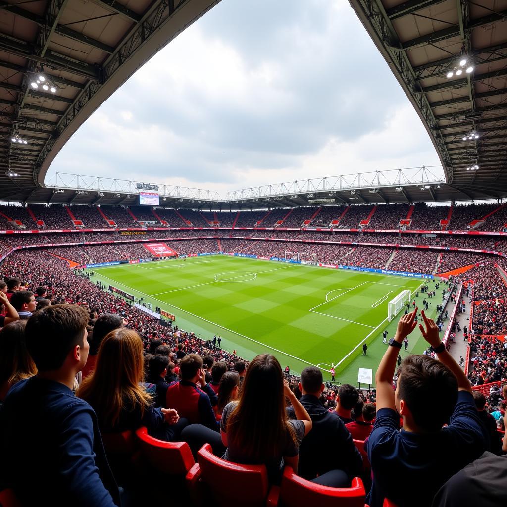 Khán đài sân vận động Mikheil Meskhi Stadium Tbilisi chật cứng khán giả đang hò reo cổ vũ đội nhà.