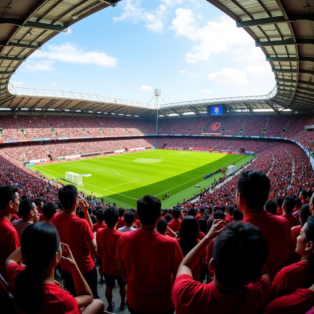 Cổ động viên cuồng nhiệt trên khán đài sân Kapten I Wayan Dipta Stadium