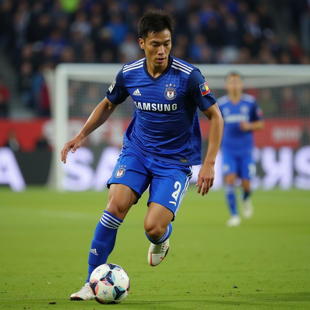 Kwon Chang Hoon trong màu áo Suwon Samsung Bluewings