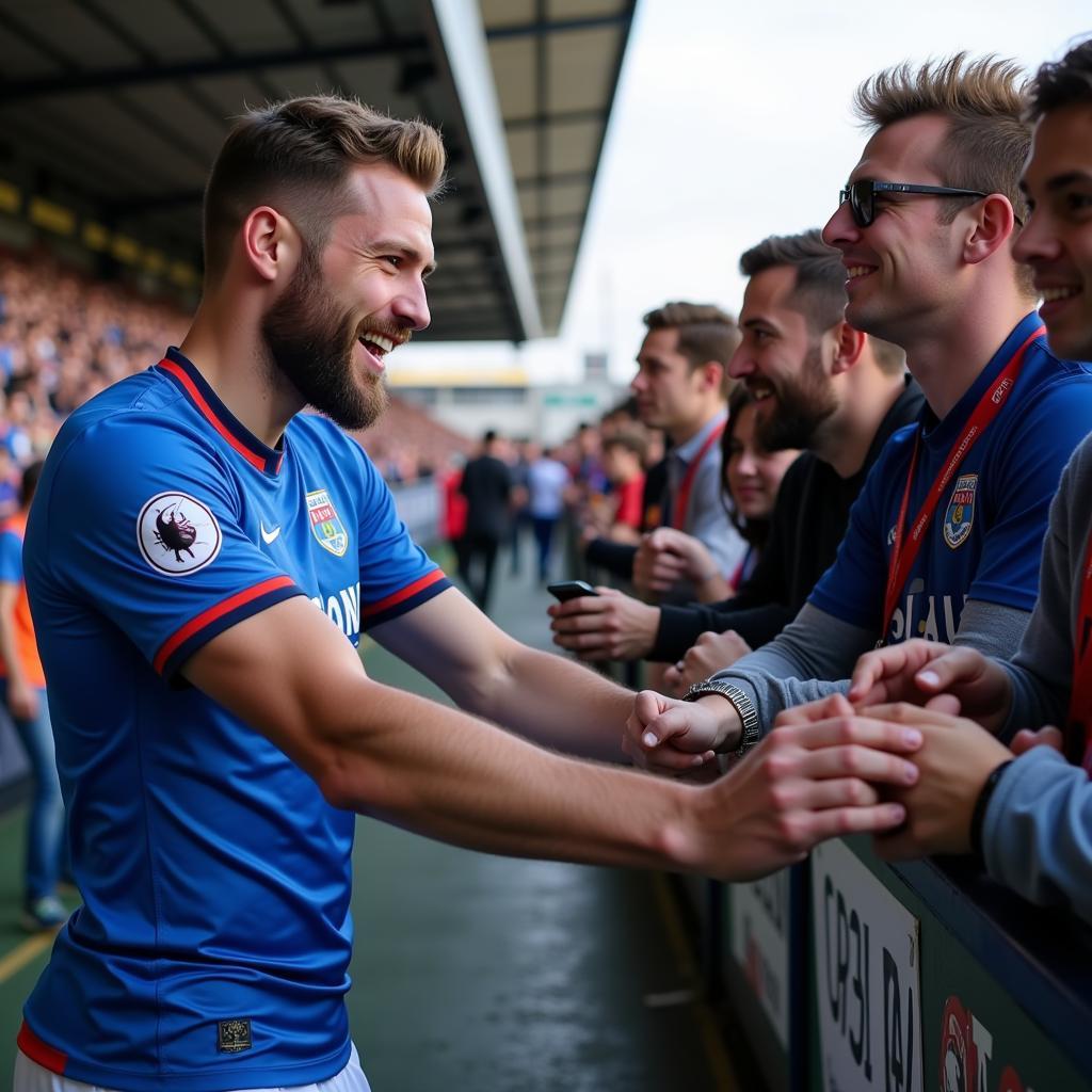 Liam Shaw giao lưu cùng cổ động viên Wigan