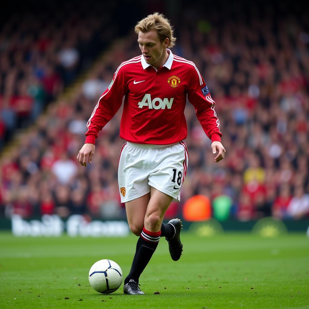 Paul Scholes mặc áo số 18 của Manchester United trong một trận đấu.