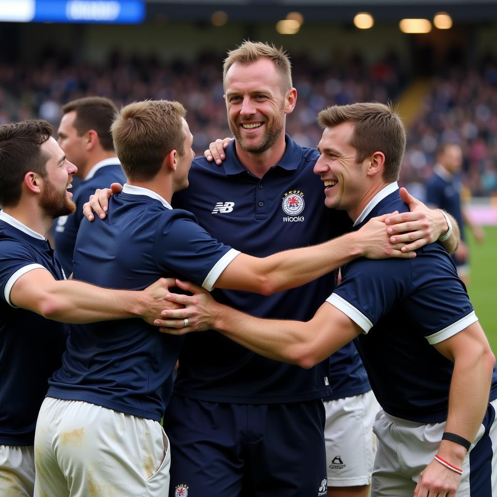 R Scott Gemmill và U20 Scotland ăn mừng chiến thắng