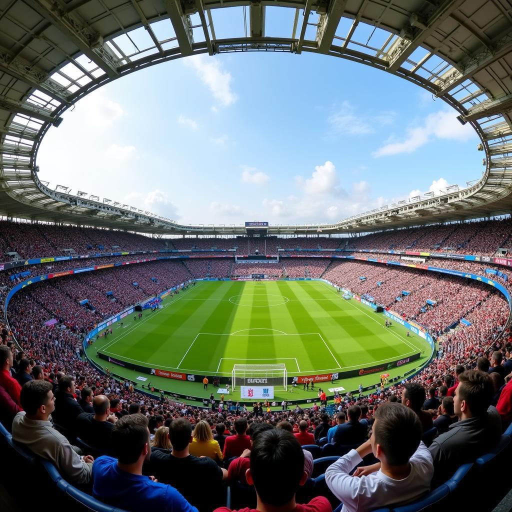 Toàn cảnh sân vận động Pristina City Stadium với khán đài đông đúc trong một trận đấu bóng đá.