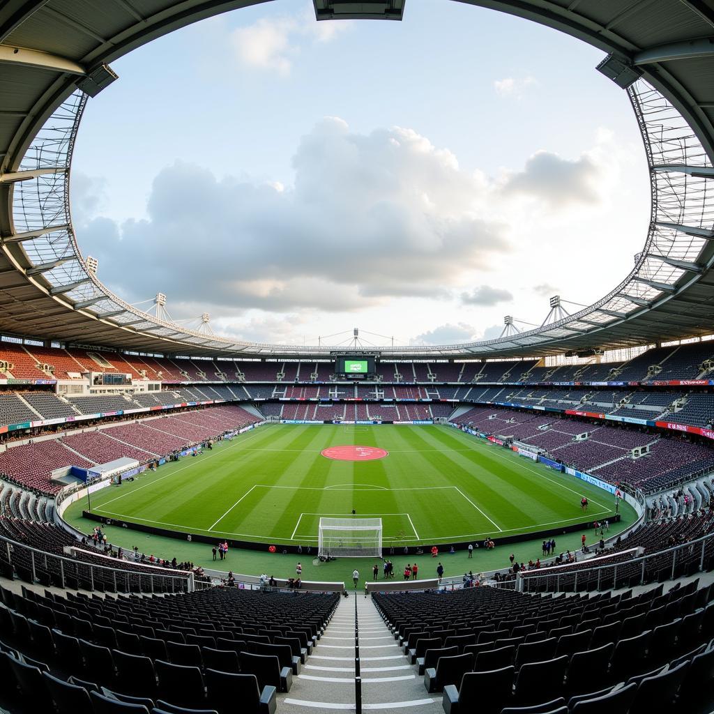 Wankdorf Stadium in Bern, Switzerland, the site of the 1954 World Cup final, during a modern-day football match.