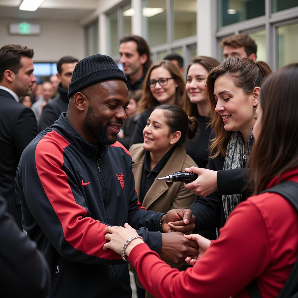 Akinfenwa Interacting with Fans