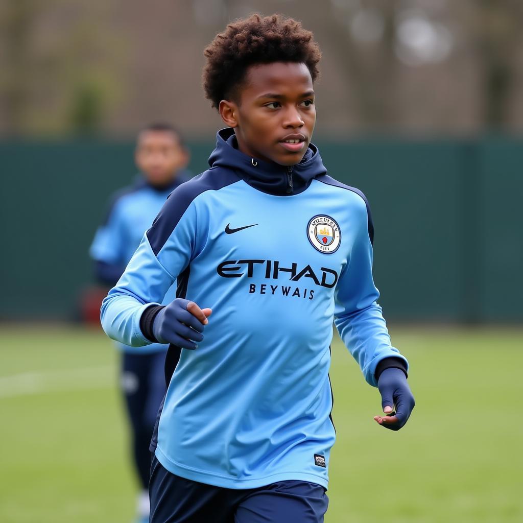 Tom Dele-Bashiru thời điểm còn ở học viện Manchester City