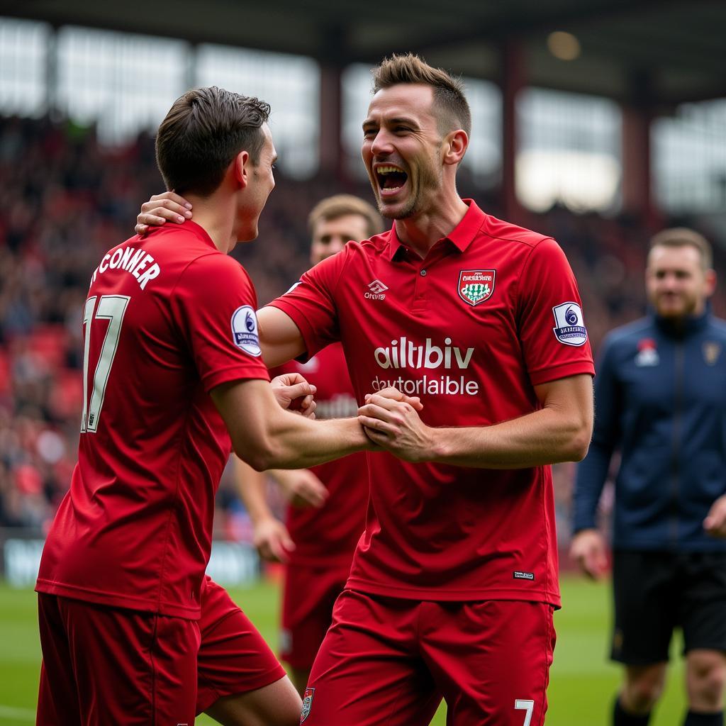 Tom O'Connor ăn mừng chiến thắng cùng đồng đội Wrexham