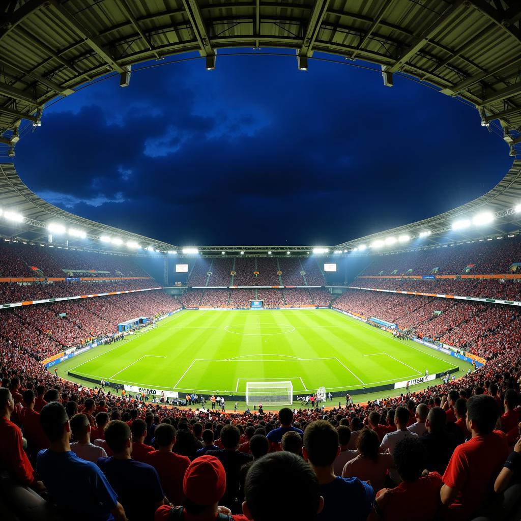 Không khí sôi động tại sân vận động Cuscatlan Stadium trong một trận đấu bóng đá quan trọng.